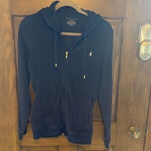 This light weight hooded jacket is in good condition.